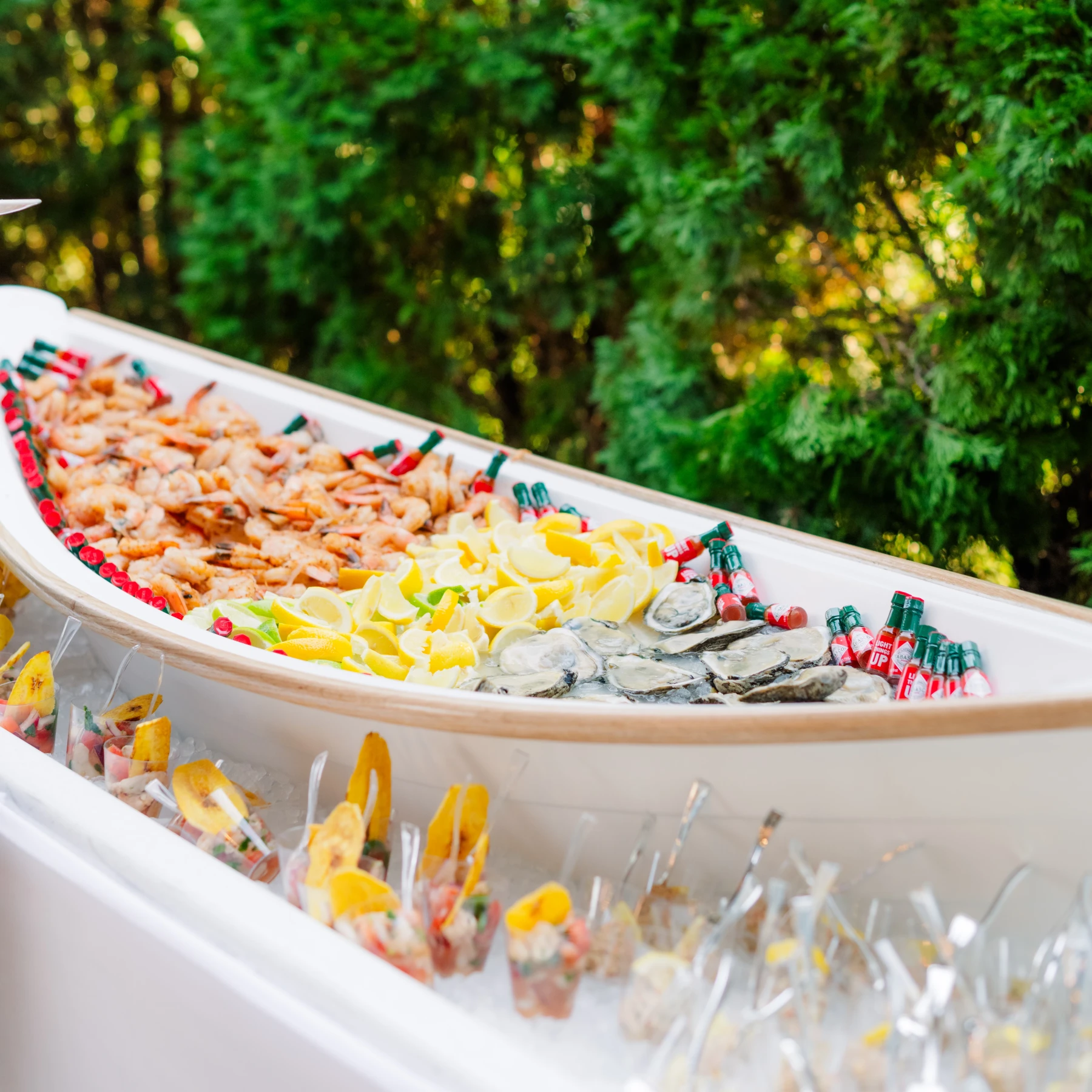 Seafood boat prepared for a wedding reception, awaiting guests