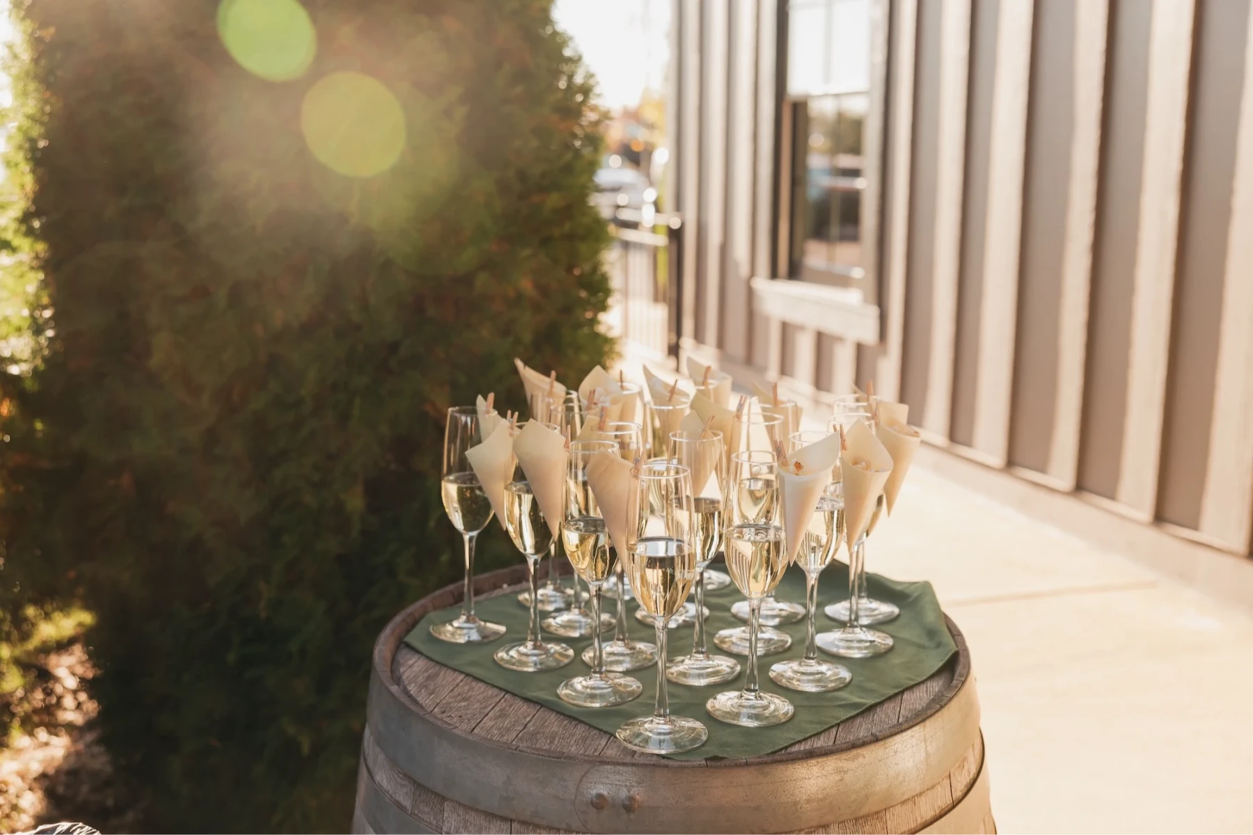 A bride and groom celebrate their wedding day with a post-ceremony cocktail hour
