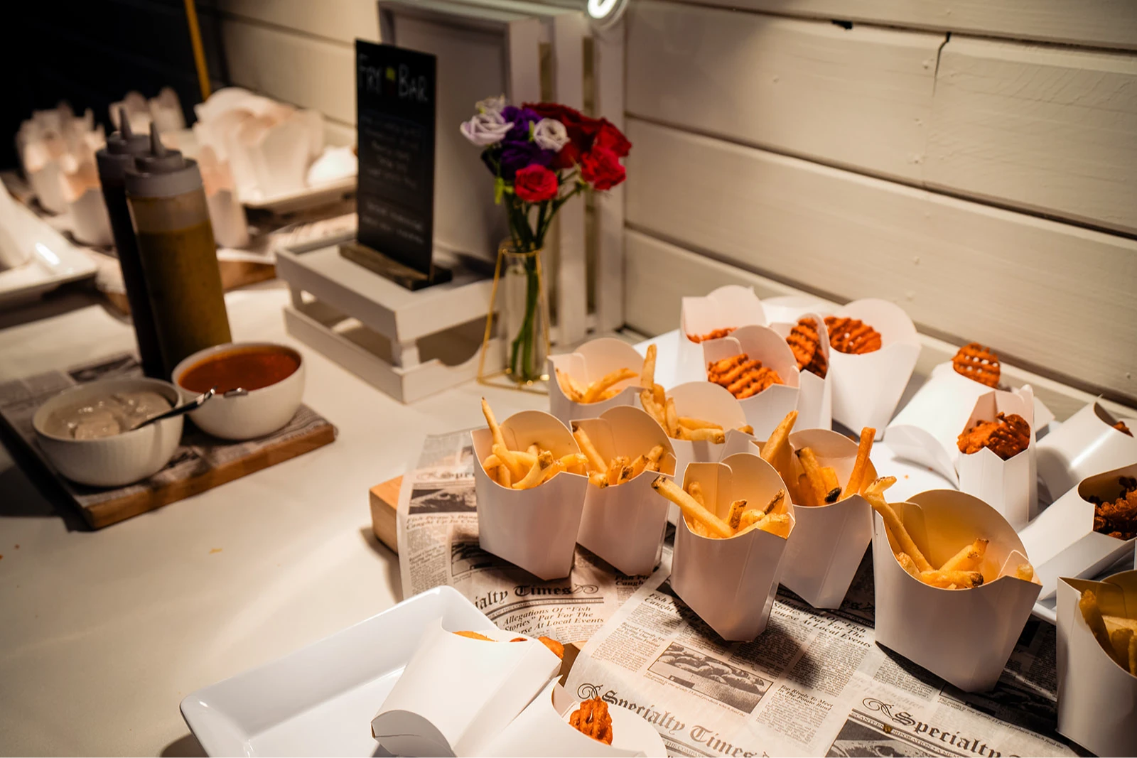 A late night french fry bar setup for wedding guests