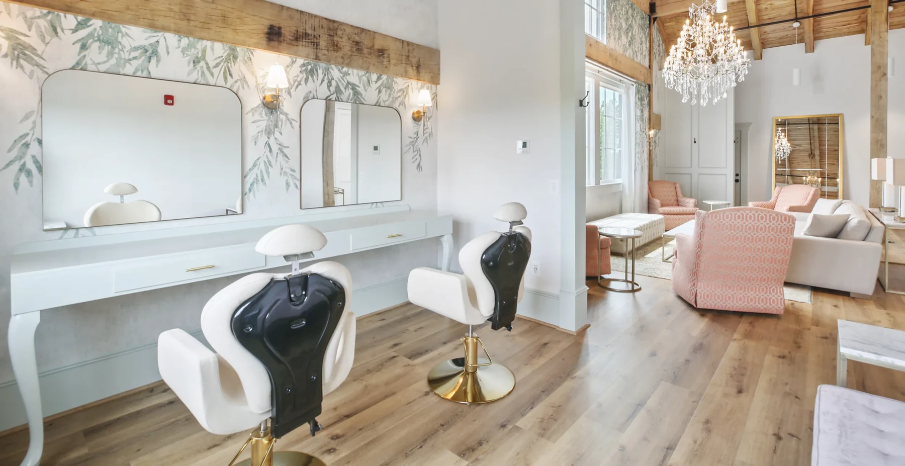 The Bridal Suite at Brentsville Hall's wedding venue, complete with couch, overstuffed chairs, and hair and makeup chairs and mirrors