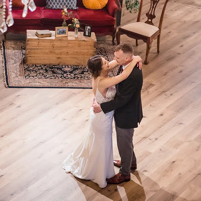 The first of many dances of bride and groom on the large dance floor at Brentsville Hall, Manassas, Virginia