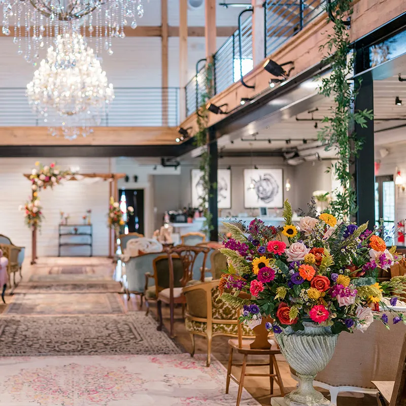 Add your own touches, be they floral bouquets, chairs, tables, photographs - whatever makes the venue your own for the day.