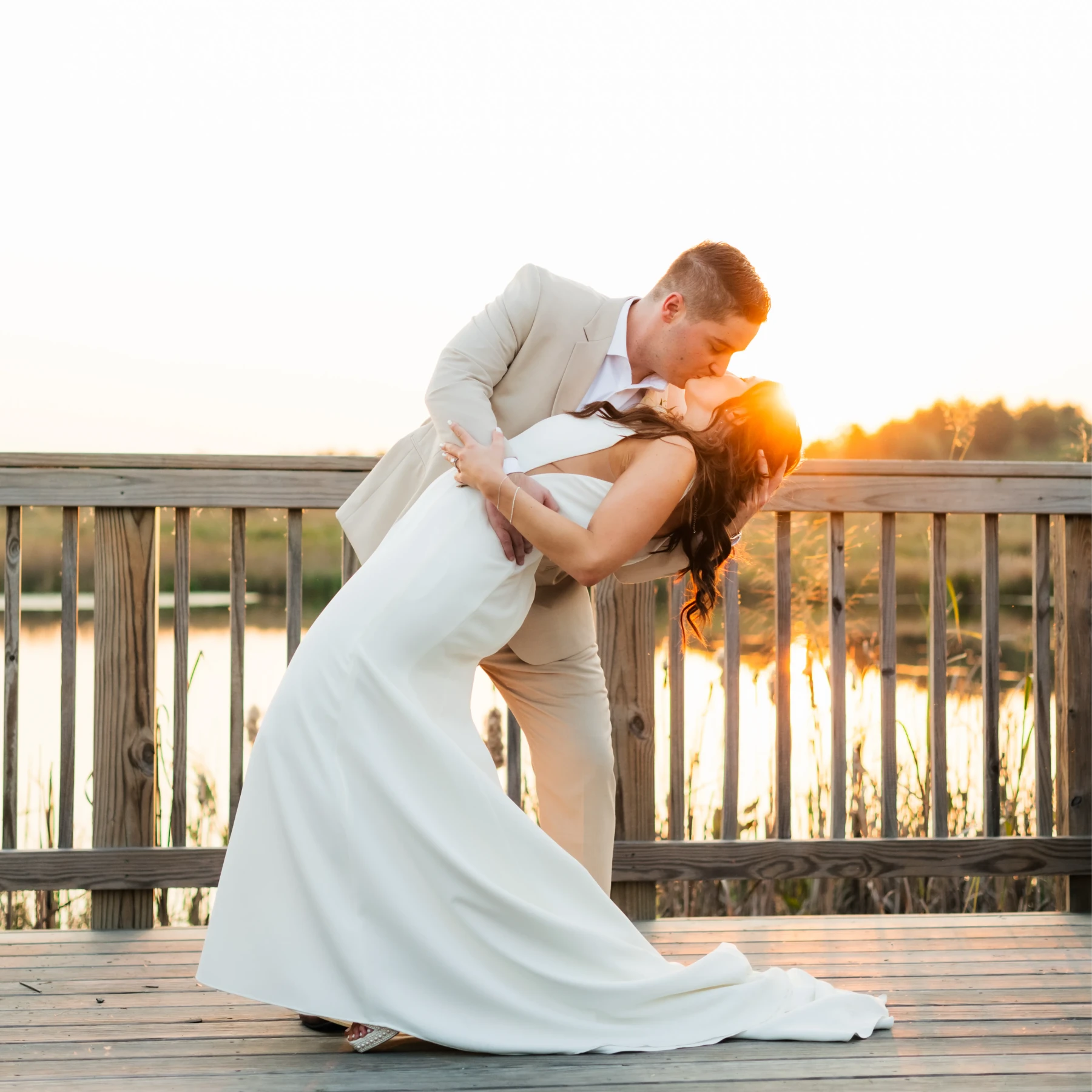A dip, a kiss on the boardwalk by the water in Manassas