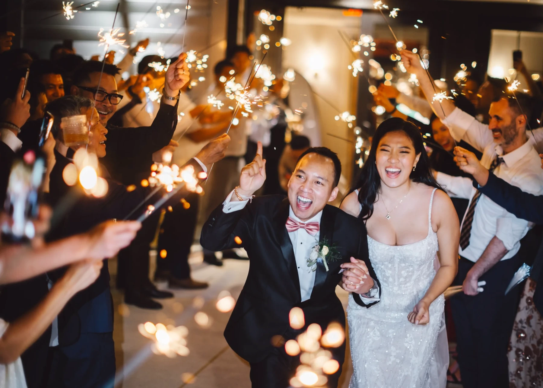 Bride and groom exit Brentsville Hall among a shower of sparklers