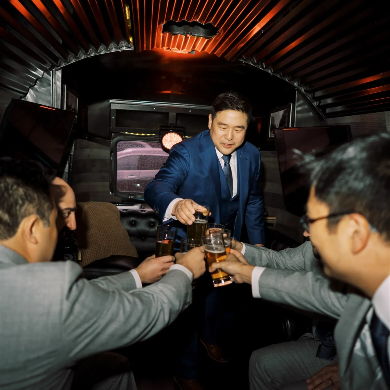 The Airstream Cigar Lounge hosts groom and groomsmen for a toast before he walks down the aisle.