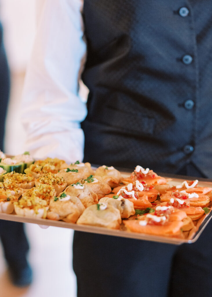 A platter of canapes are served to wedding guests at Brentsville Hall in Manassas, VA